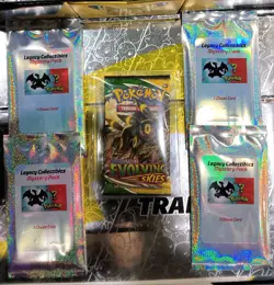 Pokemon Evolving Skies Booster Pack + 4 Legacy Collectibles Mystery Pack Bundle - Image 1