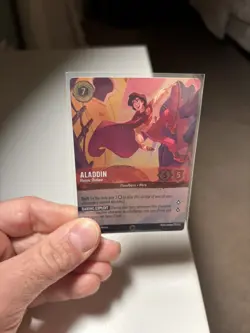 Disney Lorcana First Chapter EN 1 Aladdin Heroic Outlaw 211/204 Enchanted Holo - Image 1