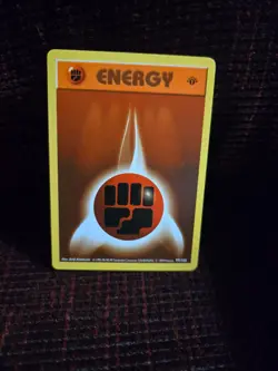 Pokemon Base Set 1st Edition Shadowless Fighting Energy - Image 1