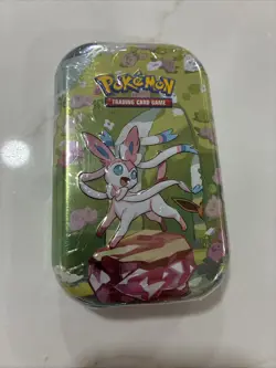 Pokemon TCG Scarlet and Violet Prismatic Evolutions Mini Tin Sylveon - Image 1
