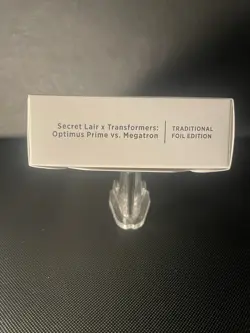 MTG Secret Lair x Transformers: Optimus Prime vs. Megatron FOIL - Image 2