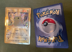 pair of Pokemon Celebrations Charizard And Pikachu Metal Cards, protective cases - Image 4