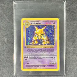 Major Holo Bleed 1st Edition Shadowless #1 ALAKAZAM 1999 Pokemon Base Card Set - Image 1