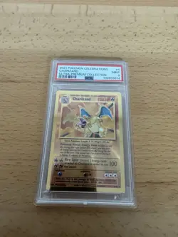 PSA 9 - 2021 Pokemon Celebrations UPC CHARIZARD Gold Metal Card #4 (3803) - Image 1