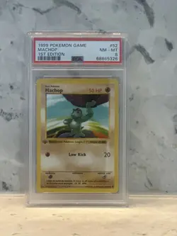 1999 Pokemon Base Set 1st Edition Machop #52 PSA 8 - Image 1