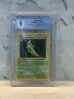 1999 Pokemon Base Set 1st Edition Metapod #54 CGC 9 - Image 1