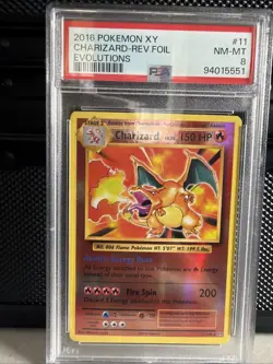 2016 POKEMON XY CHARIZARD-REV FOIL EVOLUTIONS #11 NM-MT PSA 8 - Image 1