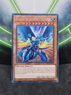 Yugioh Blue-Eyes Shining Dragon LCKC-EN008 Secret Rare 1st Edition NM - Image 1