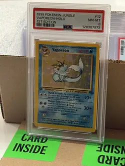 Pokemon TCG Vaporeon Holo Rare 1st Edition Jungle 12/64 Unlimited PSA 8 - Image 1