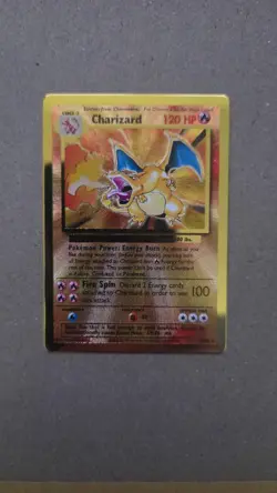 Pokemon Gold Metal Charizard and Pikachu TCG Celebrations UPC Promo, - Image 1
