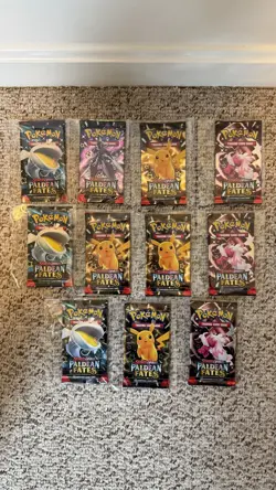 Lot of (11) Pokemon TCG Scarlet & Violet Paldean Fates Booster Packs NEW/SEALED - Image 1