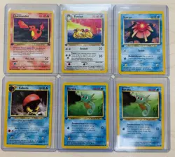 1st edition Pokemon Card Lot (Charmander, Persian, Staryu, Horsea X2, Kabuto) - Image 1