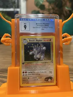 CGC 9 MINT Brock's Rhydon Gym Heroes 1st Edition 2/132 Holo Pokemon Card - Image 1