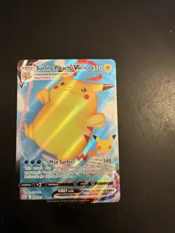 Pokemon TCG Surfing Pikachu VMAX 009/025 Celebrations NM Condition - Image 1