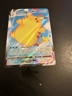 Pokemon TCG Surfing Pikachu VMAX 009/025 Celebrations NM Condition - Image 2