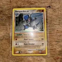 Pokemon TCG Platinum Rampardos Holo Rare Card 13/127 LP - Image 1