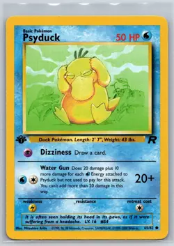 NM Psyduck 65/82 1st Edition Team Rocket Pokemon 2000 - Image 1