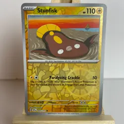 Stunfisk 64/191 Surging Sparks Reverse Holo Common Pokemon Light Play+ - Image 1