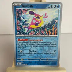 Bruxish 49/191 Surging Sparks Reverse Holo Common Pokemon Light Play+ - Image 1