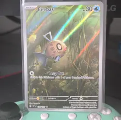 Pokemon Feebas 198/191 Sv08: Surging Sparks Illustration Rare Holo Card - Image 1