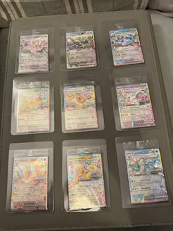 Prismatic Evolutions Surprise Box Stamped EX Promo Cards 9/9 Complete Set sealed - Image 1