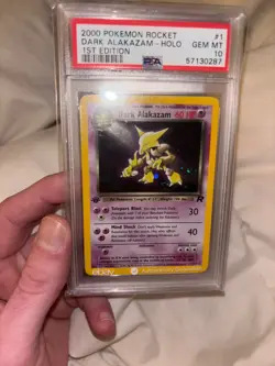 2000 POKEMON ROCKET 1ST ED #1 DARK ALAKAZAM-HOLO PSA 10 - Image 1