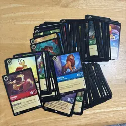 Lot of 200 Plus Disney Lorcana Cards - Image 1
