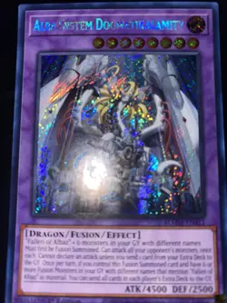 YuGiOh ALBA SYSTEM DOGMATIKALAMITY Secret Rare BLMM-EN011 - Image 1