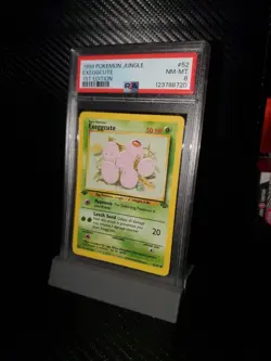 1999 POKEMON JUNGLE 1ST ED #52 EXEGGCUTE PSA 8 - Image 1