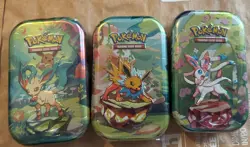 Pokemon Mini Tin Sealed Lot of 3 TCG Scarlet & Violet Prismatic Evolutions mint - Image 1