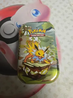 *EMPTY NO PACKS* Pokemon Prismatic Mini Tin Includes Art Card & Coin. Jolteon - Image 2