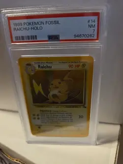POKEMON RAICHU FOSSIL HOLO #14 PSA 7 - Image 1