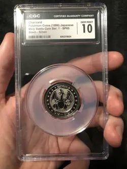 Charizard Pokemon Rare Vintage Meiji Battle Coin Japanese CGC 10 Gem Mint 10 - Image 1