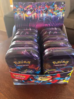 Pokemon TCG Mega Heroes Mini Tin Evolutions opened box with 10 new/sealed tins - Image 1
