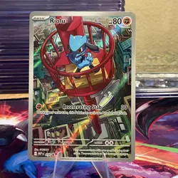 Pokemon Mega Evolutions Riolu Black Star Promo Illustration Rare #10 NM - Image 1