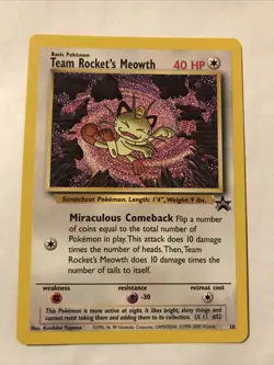 Team Rocket's Meowth Black Star Promo Pokemon Card #18 - Image 1