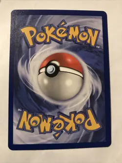Team Rocket's Meowth Black Star Promo Pokemon Card #18 - Image 2