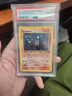 2001 POKEMON NEO DISCOVERY UNLIMITED #5 HOUNDOUR-HOLO PSA 8 SWIRL - Image 1