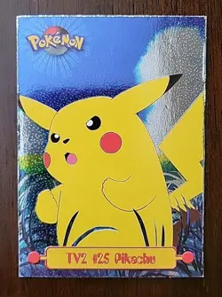 DMG! Pikachu TV2 #25 Topps Series 1 - Textured FOIL Black Logo Pokemon TCG - Image 1