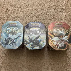2012 Pokemon Zekrom EX, Reshiram EX, & Kyrume Ex Tin Set (3 Tins) Factory Sealed - Image 1