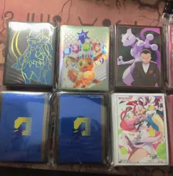9 Sealed Sets Of TCG Sleeves + 1 Deck Box, Includes Digimon, Pokemon, One Piece - Image 1