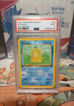 2000 Pokemon Team Rocket Pysduck 1st Edition #65 PSA 9 MINT - Image 1