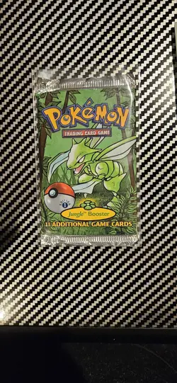 Wizards of the Coast First Edition Pokemon Jungle Booster Pack 742818060639 - Image 1