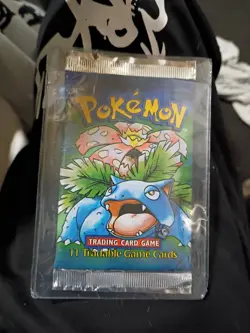 Factory Sealed 1999 Shadowless Pokemon Base Set Booster Pack 9781575306032 - Image 1