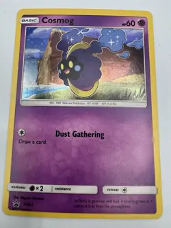 Cosmog SM42 Black Star Promo Card Sun & Moon - Image 1