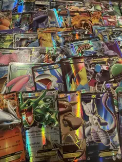 100 valuable Pokemon cards in great condition. GXs, EXs, and a mega-sized BREAK! - Image 1