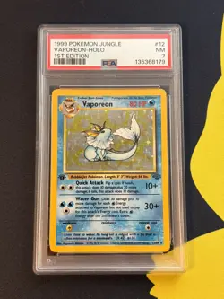 Pokemon PSA 7 NM 1st Edition Jungle Holo Vaporeon 12/64 - Image 1