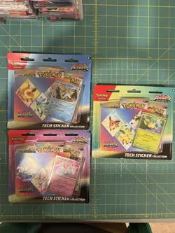 Pokemon Prismatic Evolutions Booster Pack Tech Sticker Collect. Sealed Lot of 3 - Image 1