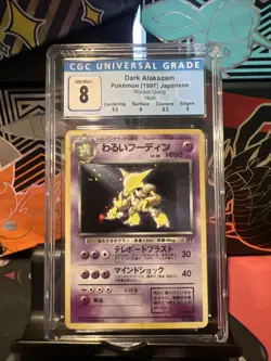 Pokemon 1997 Japanese Rocket Gang 065 Dark Alakazam Holo CGC 8 NM Mint CGC - Image 1