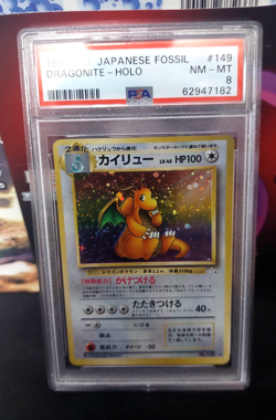 1997 Pokemon Japanese Fossil #149 Dragonite Holo PSA 8 NM_MT - Image 1